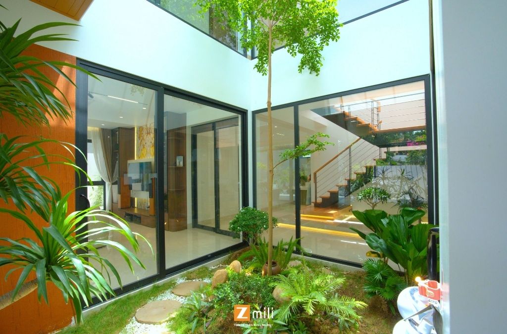 Mẫu nhà phong cách hiện đại 2 tầng với khoảng thông tầng xanh mát